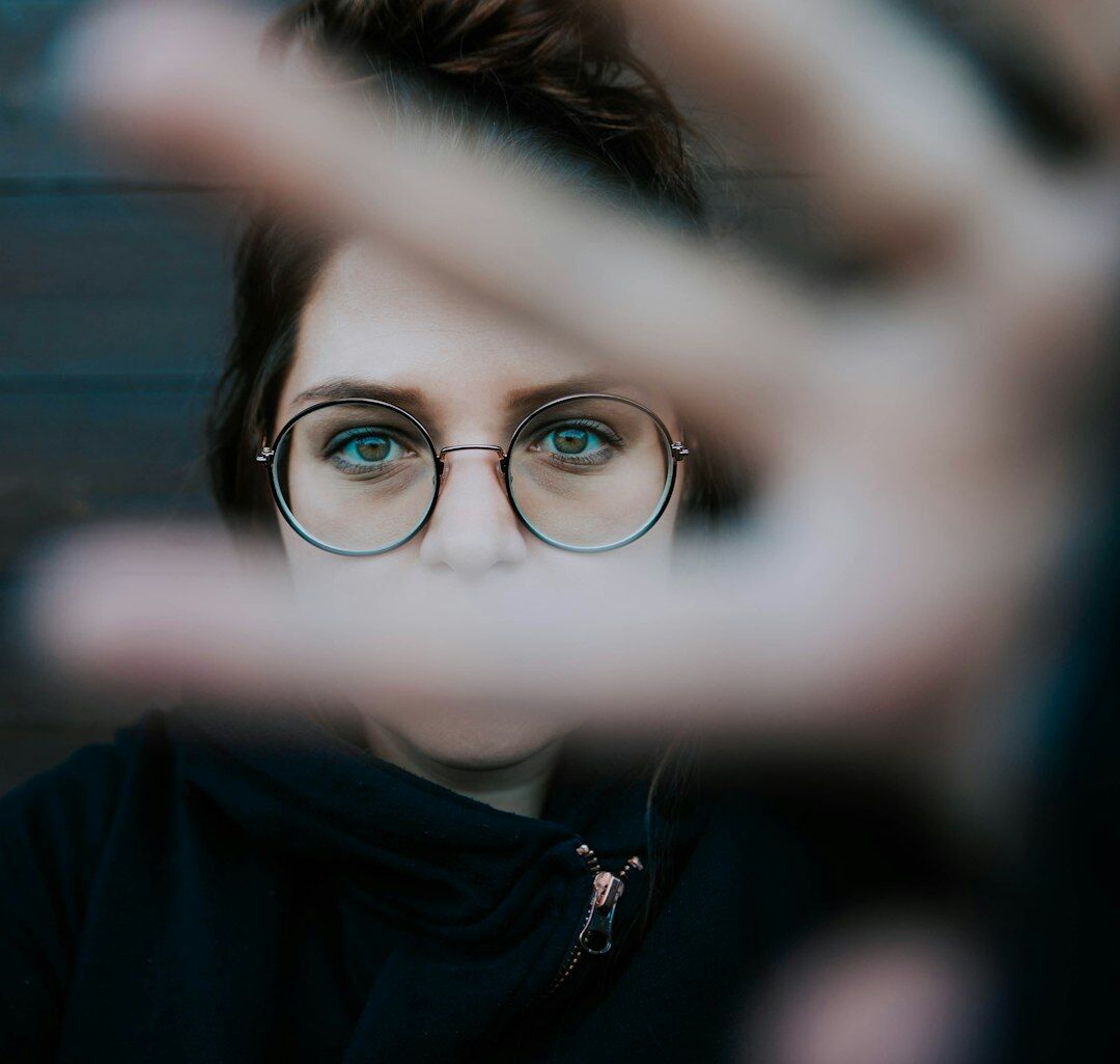 Professional female executive portrait with glasses