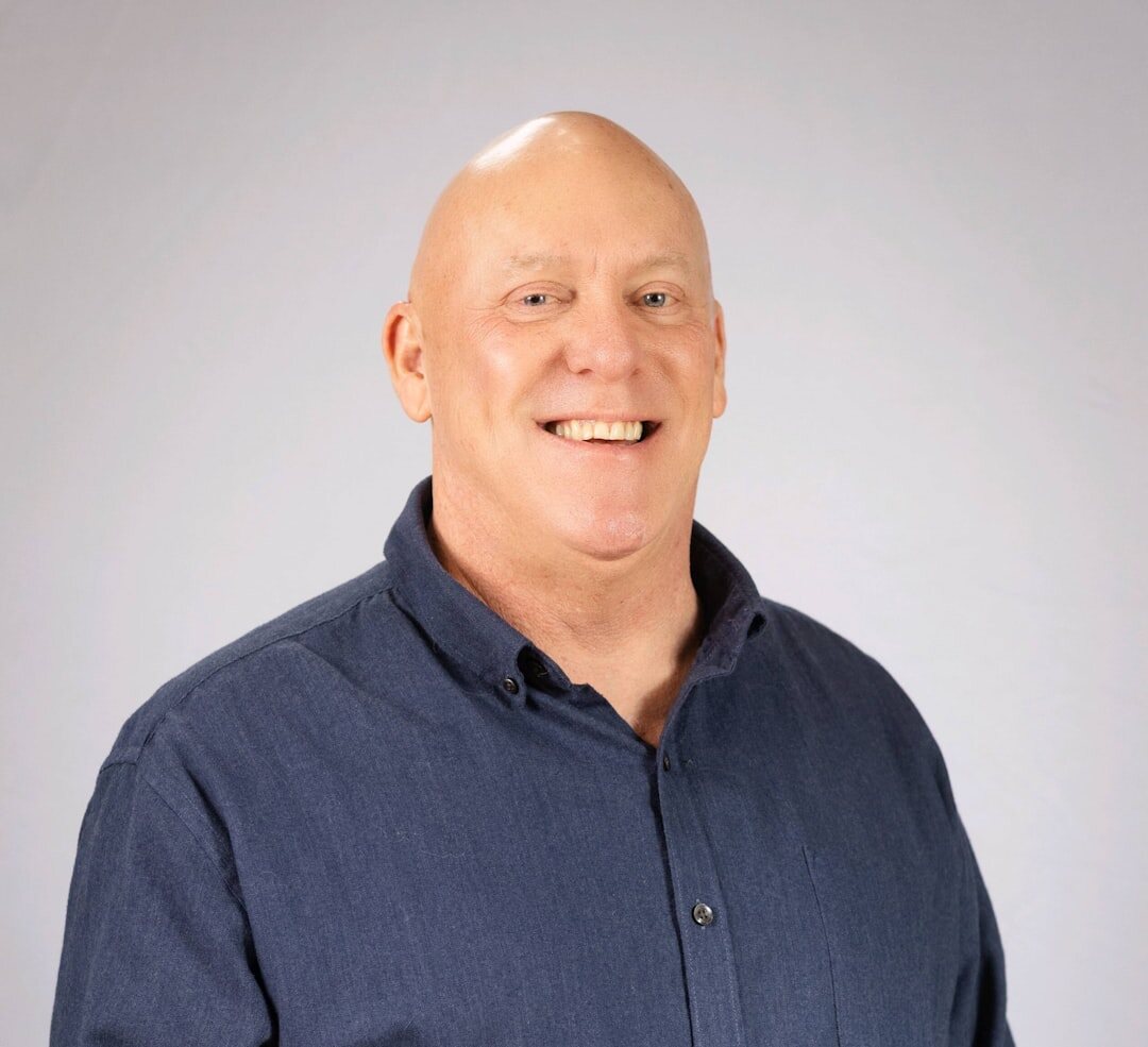 Professional male speaker smiling